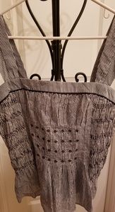 Navy blue and white striped, halter top.